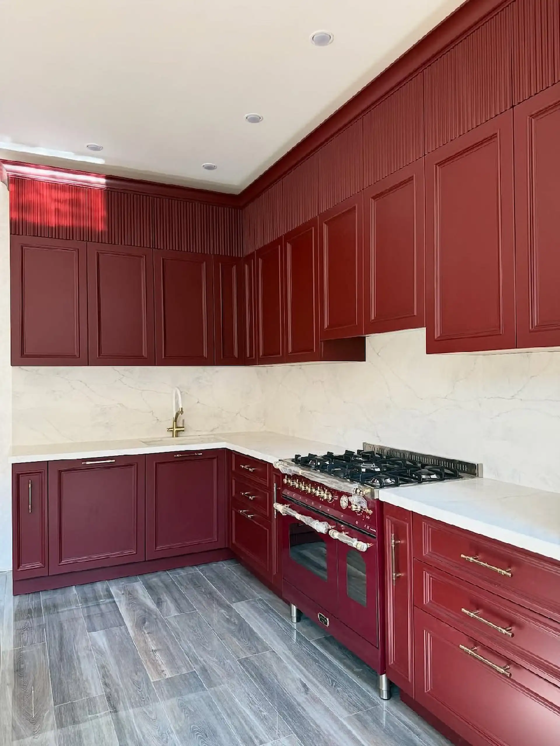 kitchen remodel Newport Beach burgundy cabinet installation