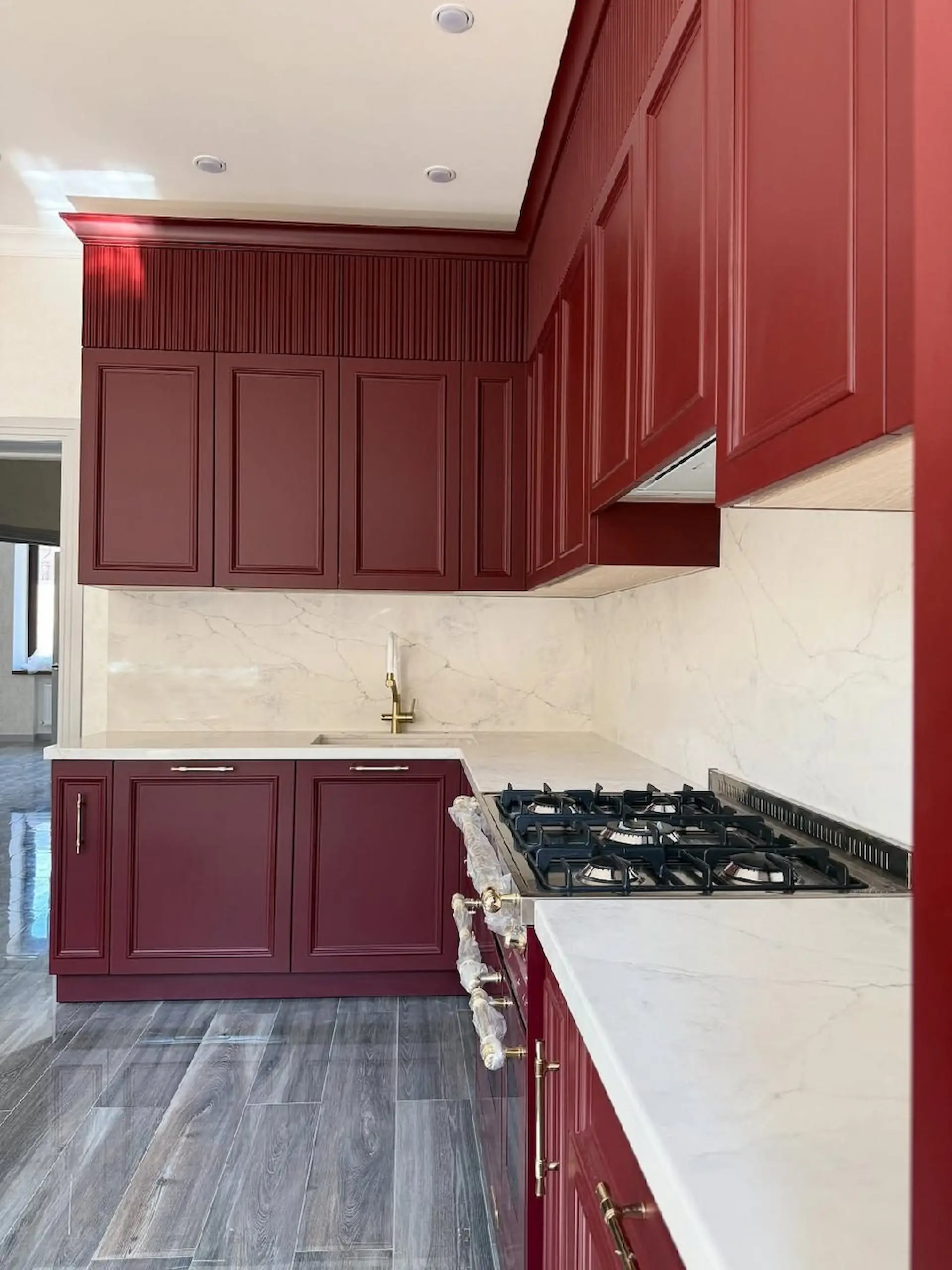 Newport Beach kitchen remodel with gold hardware